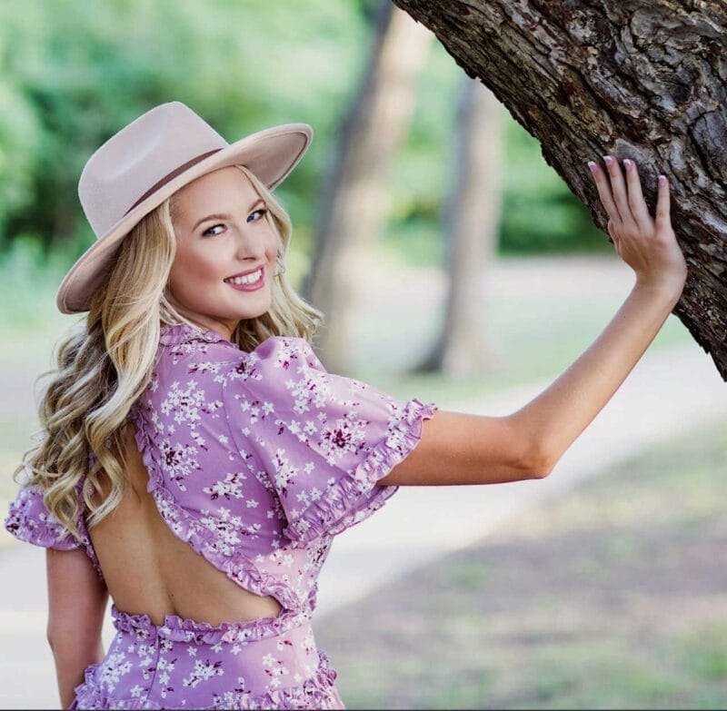 High School Senior Portrait: Senior Gal by Tree Looking Over Shoulder