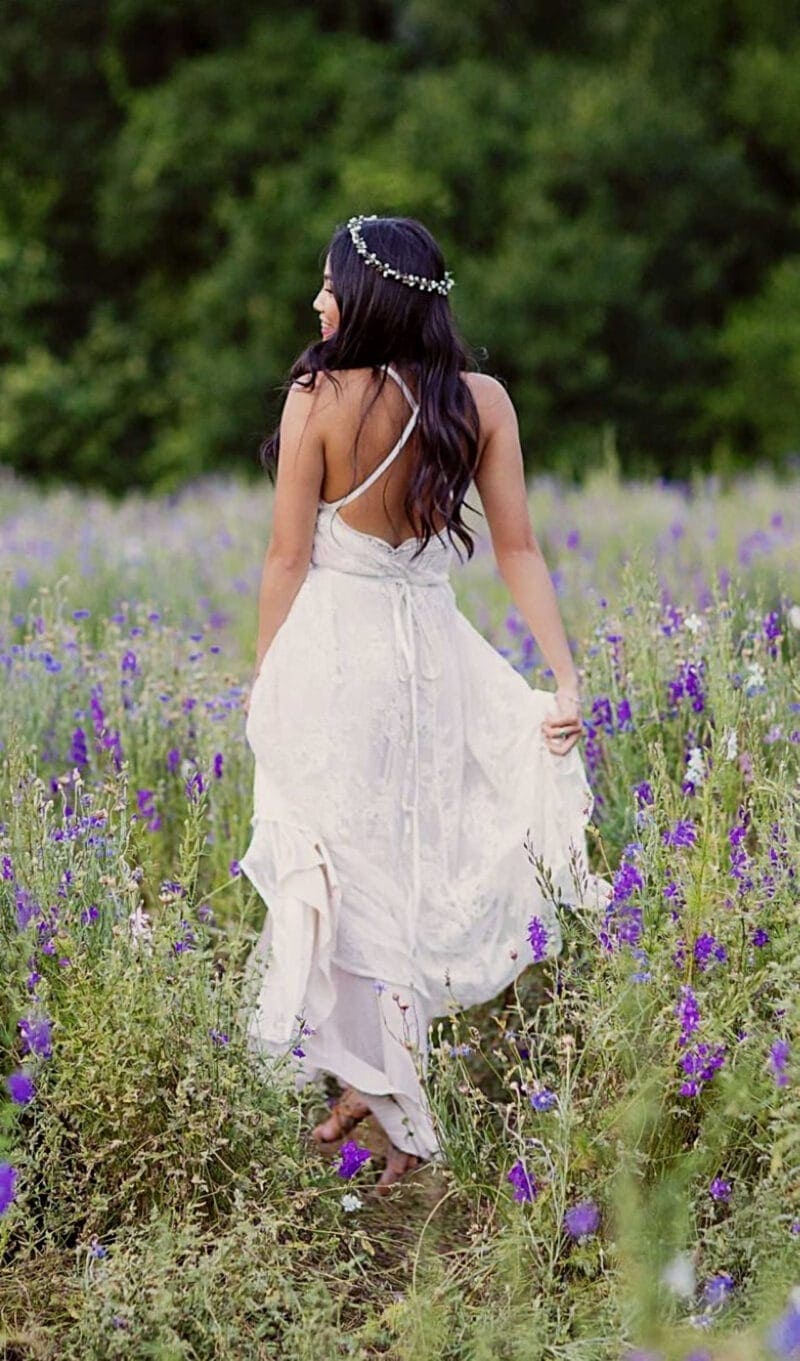High School Senior Portrait: Walking in a Lilac Field
