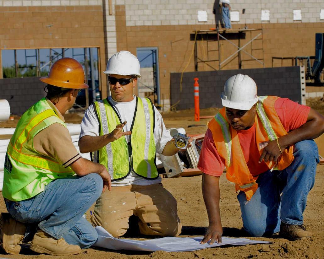 Idaho Construction Workers Reviewing Plans