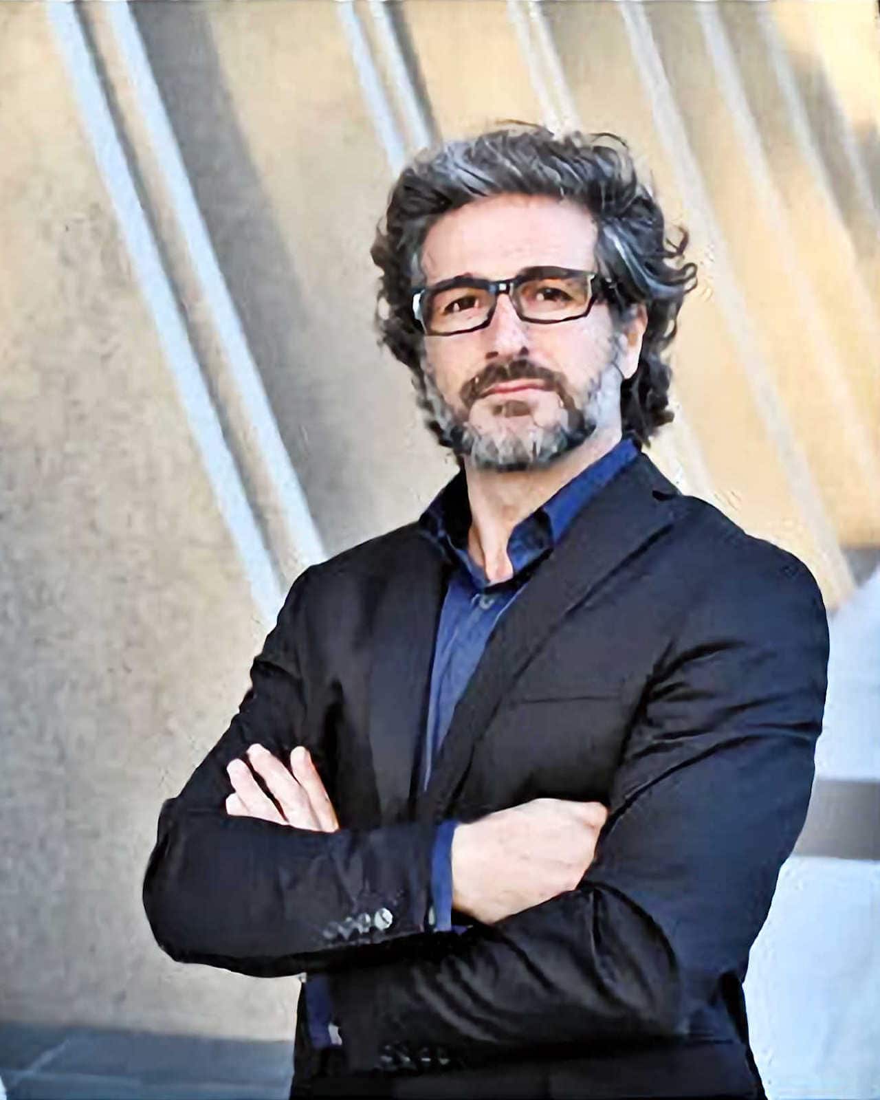 Business 3/4 Headshot: Man in Suit - Arms Crossed