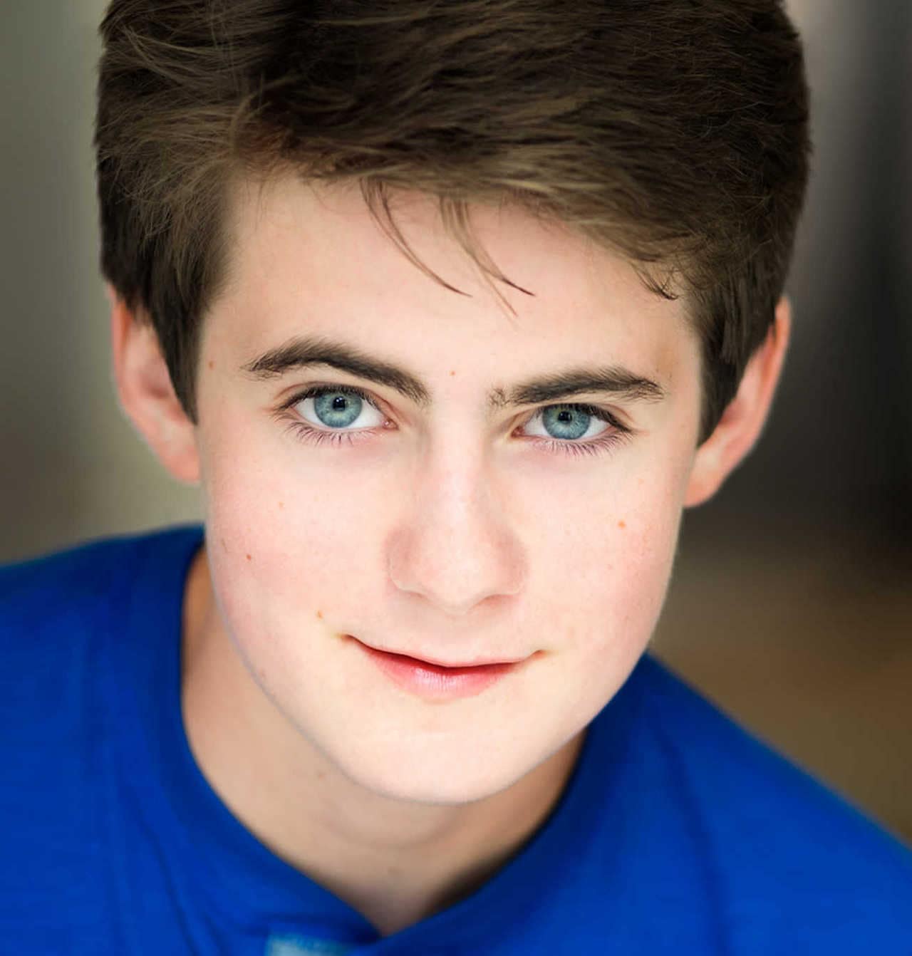 Actor Headshots: Child Male with Blue Shirt and Eyes