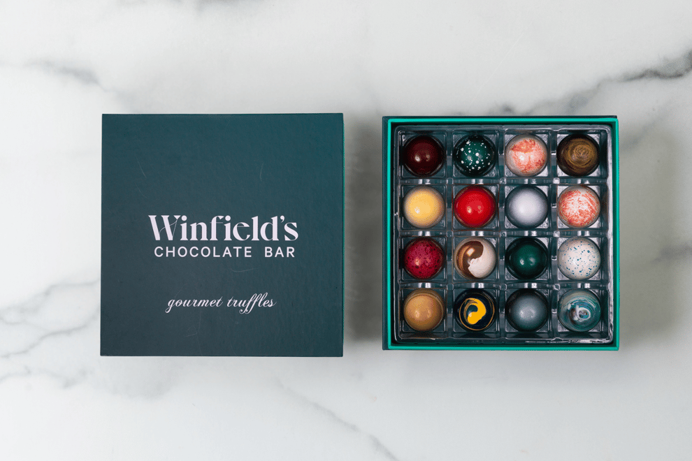 16pc Truffle Box - Open with Marble 7-11-25.png