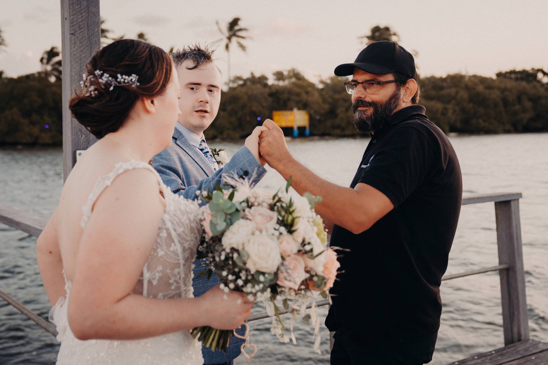 Roman helping a couple at Sandstone Point Jetty