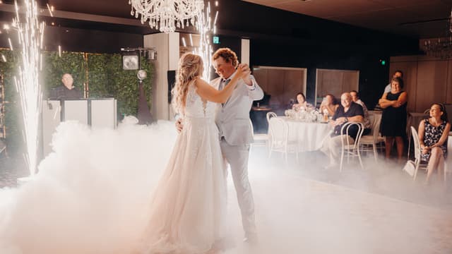 Chloe & Brodie at Sandstone Point Hotel
