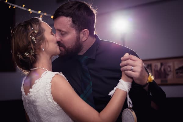 The bride Francesca and groom Ben share a close moment dancing together at the reception in The Malouf Room, Toowong Rowing Club.