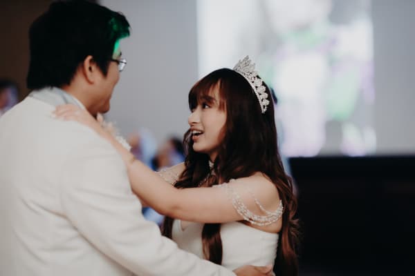 Bride Henny and groom Timothy dance together at the reception stage of Royal on the Park.