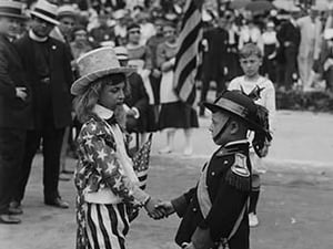 Costumed Child dressed as Uncle Sam welcomes another toddler representing the Italian community of the United States for an Italy-American Friendship Even held in New York City - Art Print