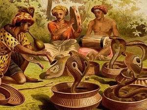 Indian Fakirs with King Cobras by Friedrich Wilhelm Kuhnert - Art Print