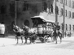 Police On Horseback Guard a Team Driven Wagon during car Strike - Art Print