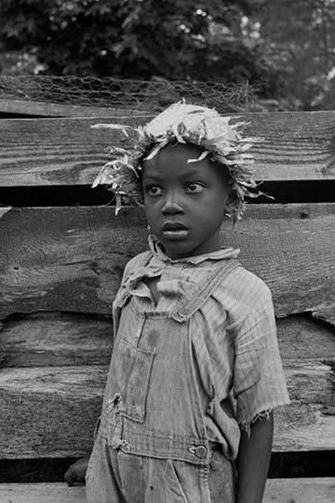 Grandson of Negro tenant whose father is in the penitentiary by Dorothea Lange - Art Print