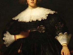 Portrait of a Seated Woman with Pendant by Rembrandt Van Rijn - Art Print