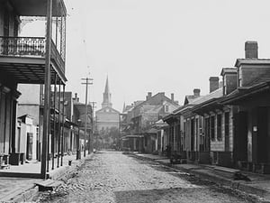 Sole Pedestrian in New Orleans's Street by Jackson - Art Print