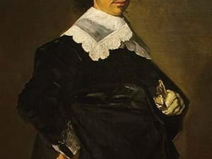Portrait of a Man Holding Gloves by Rembrandt Van Rijn - Art Print