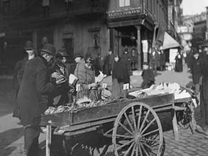 Banana Vendor sells from Cart by Byron - Art Print