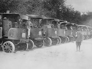 A Fleet of Trucks each with its own Driver is arrayed and ready to transport troops. - Art Print