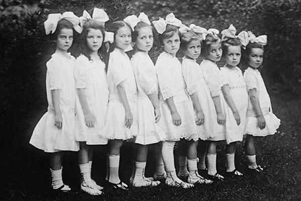 Line up of Beautiful Kindergartners in a row wearing white dresses - Art Print