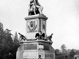 Man Standing in Front of Lincoln Statue
