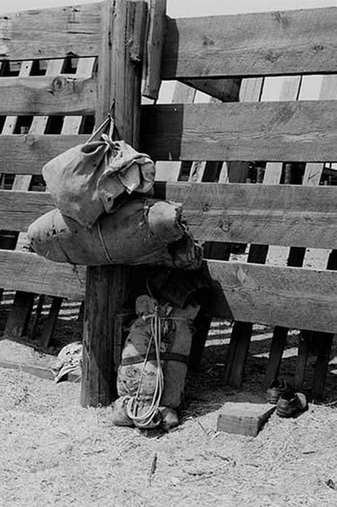 Bundles Against Cattle Corrals by Dorothea Lange - Art Print