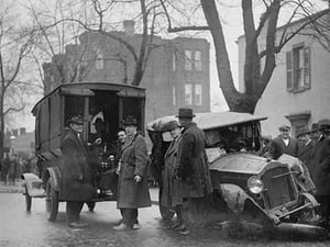 Bootleggers carted off to Prison after their Car was Wrecked in a Police Chase - Art Print