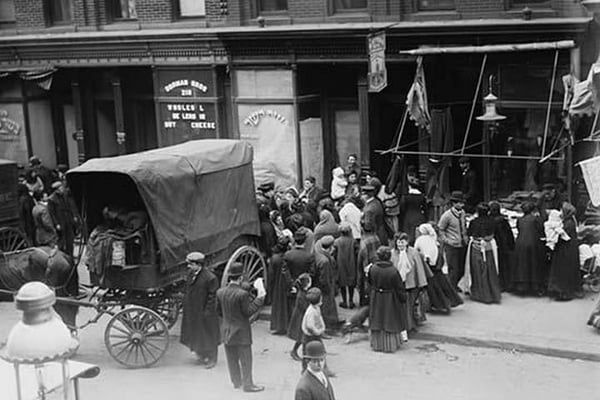 Crowd gathered in front of butcher shop during meat riot