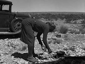 Cooking on the Ground in the Heat by Dorothea Lange - Art Print