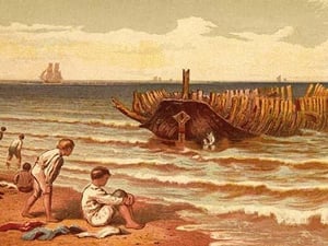 Childen play on the beach near the hulk of a wrecked boat with its ribs exposed by Kronheim & Dalziels - Art Print