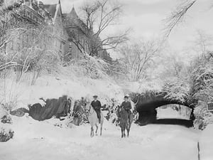 Two Horseback Riding during a Snowfall in Manhattan's Central Park - Art Print