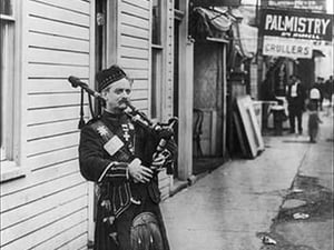 Scottish Bagpiper by Irving Underhill - Art Print