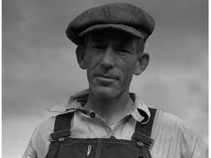Father of landless sharecropper family by Dorothea Lange - Art Print