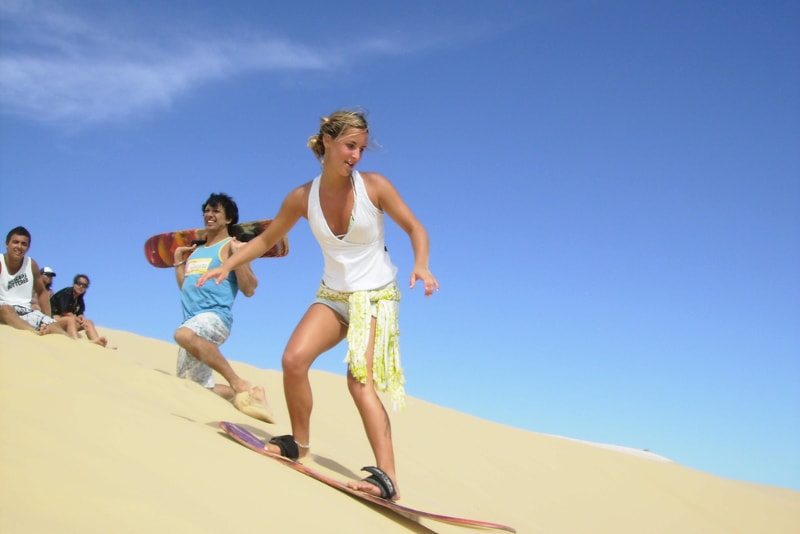 Sandboarding in Dubai desert