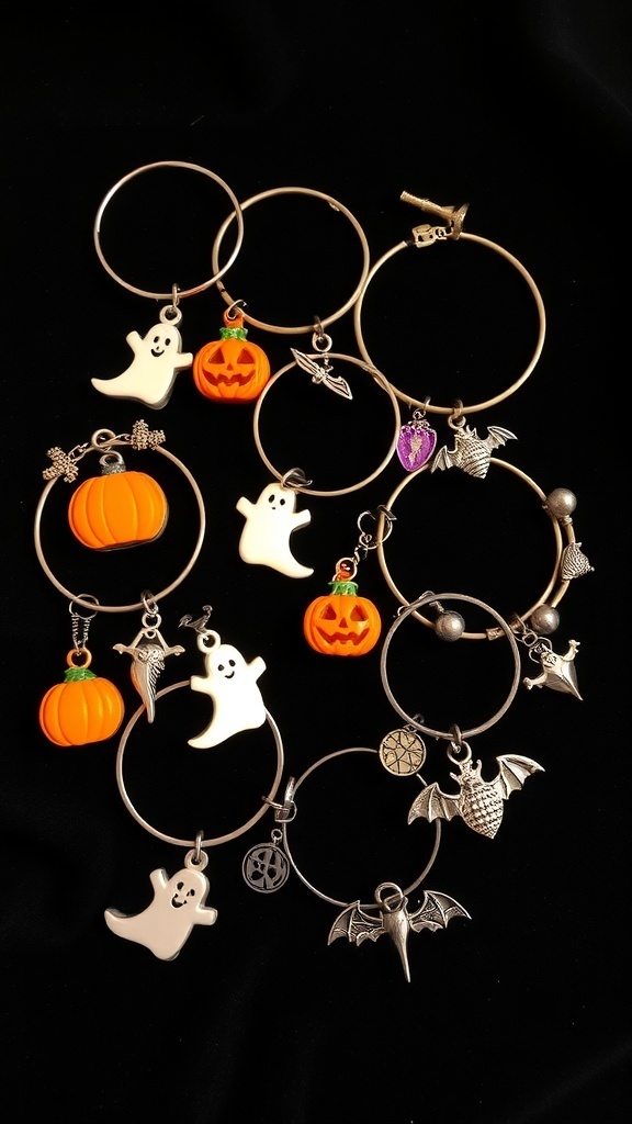 A collection of Halloween-themed charm bracelets featuring ghosts, pumpkins, and bats.