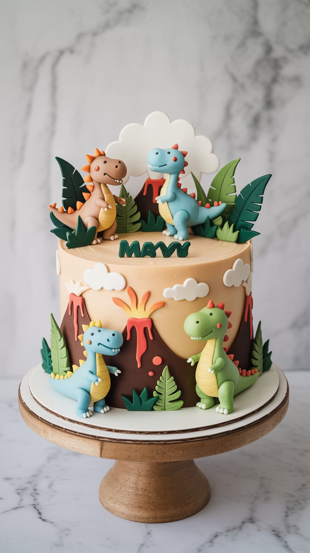 A dinosaur-themed cake with colorful dinosaur figurines and a volcano, decorated with green leaves.