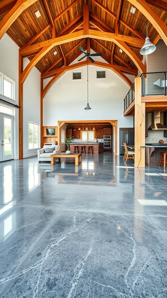 Interior of a modern barndominium featuring a polished epoxy floor and timber frame architecture.