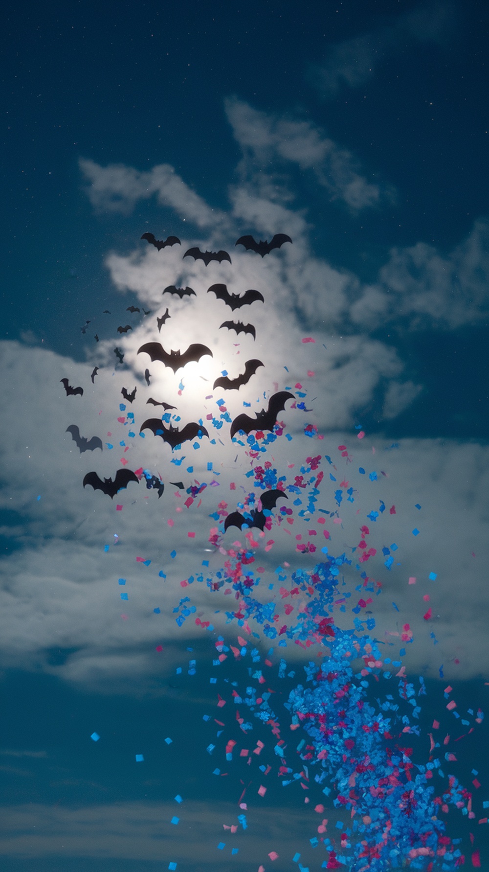 Colorful confetti and bats in a Halloween-themed gender reveal