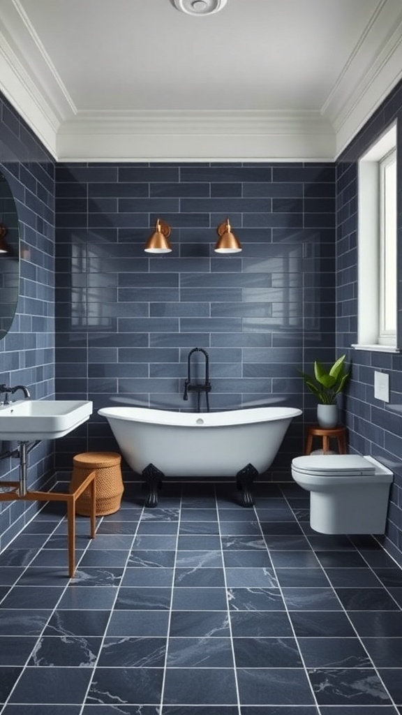 A stylish bathroom with dark blue floor tiles, a freestanding bathtub, and copper light fixtures.