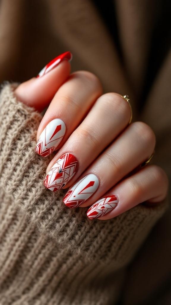 Close-up of hands with geometric red and white nail patterns