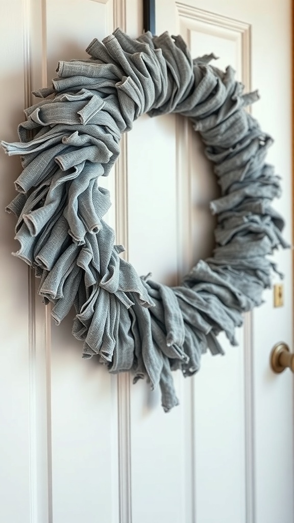 A fluffy gray rag wreath hanging on a door.