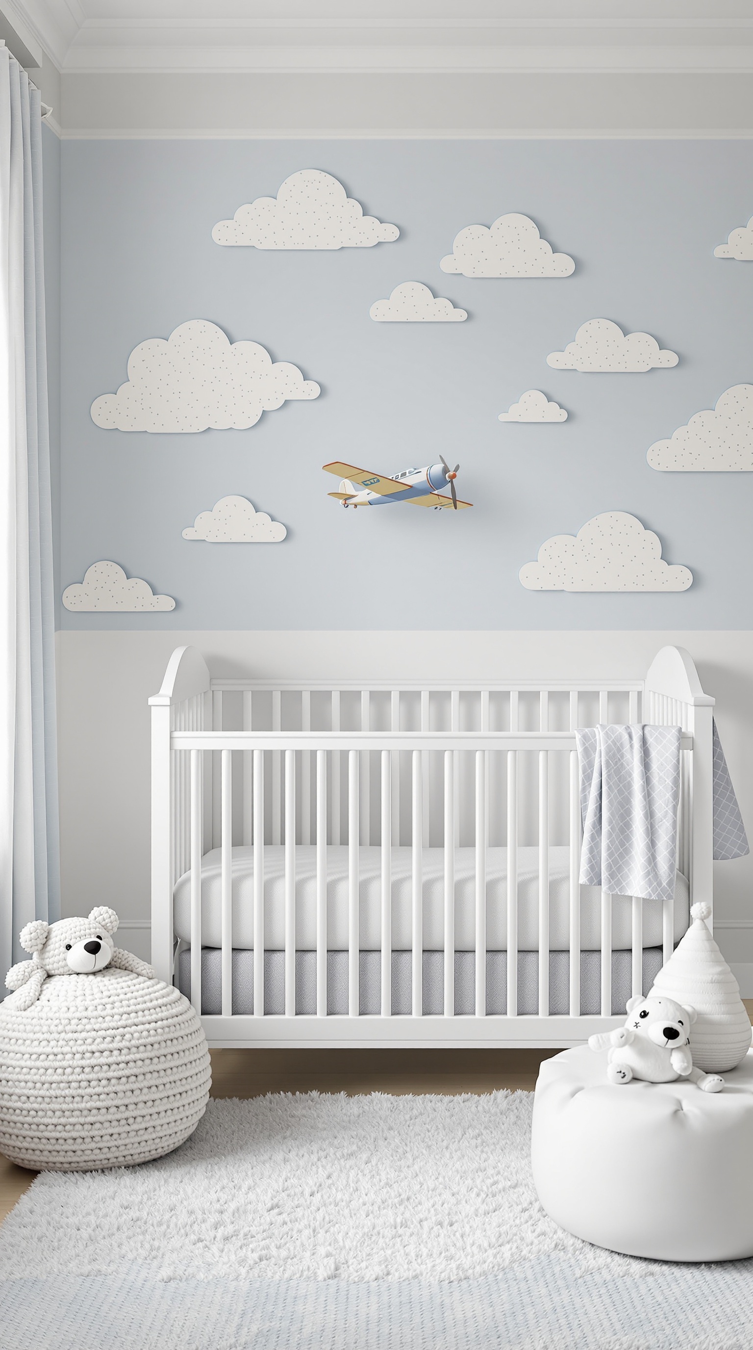 A vintage airplane themed nursery for a baby boy, featuring blue walls, white clouds, and a crib.