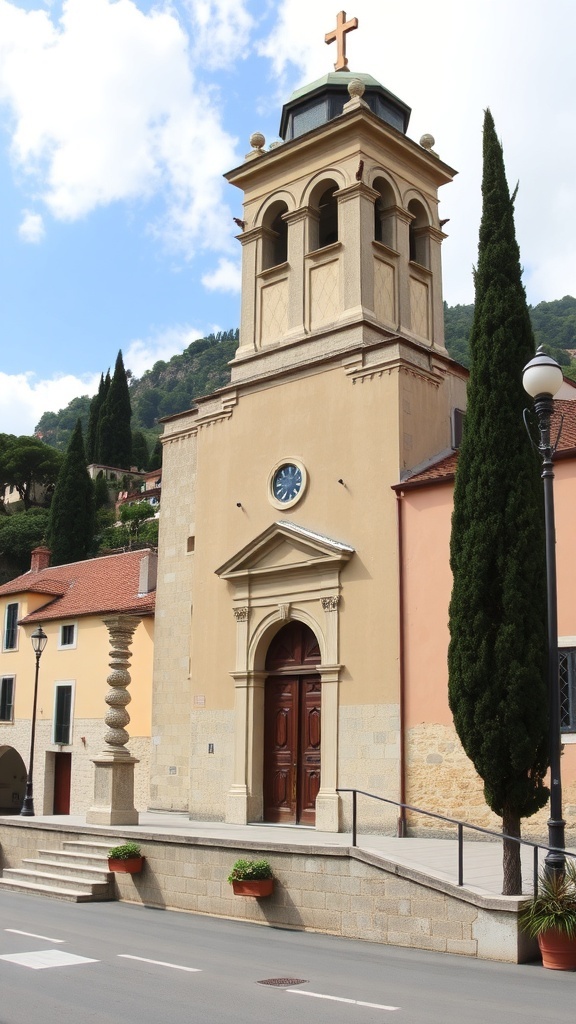 The Church of St. George in Portofino, Italy, featuring a tall bell tower and warm-colored facade.