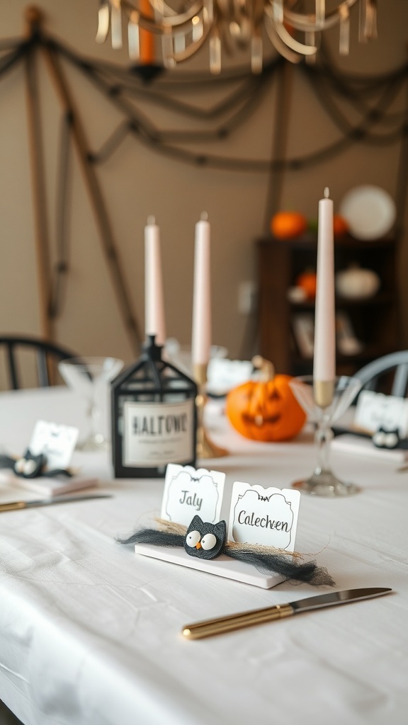 A Halloween tablescape featuring DIY place cards with owl designs and a pumpkin centerpiece.