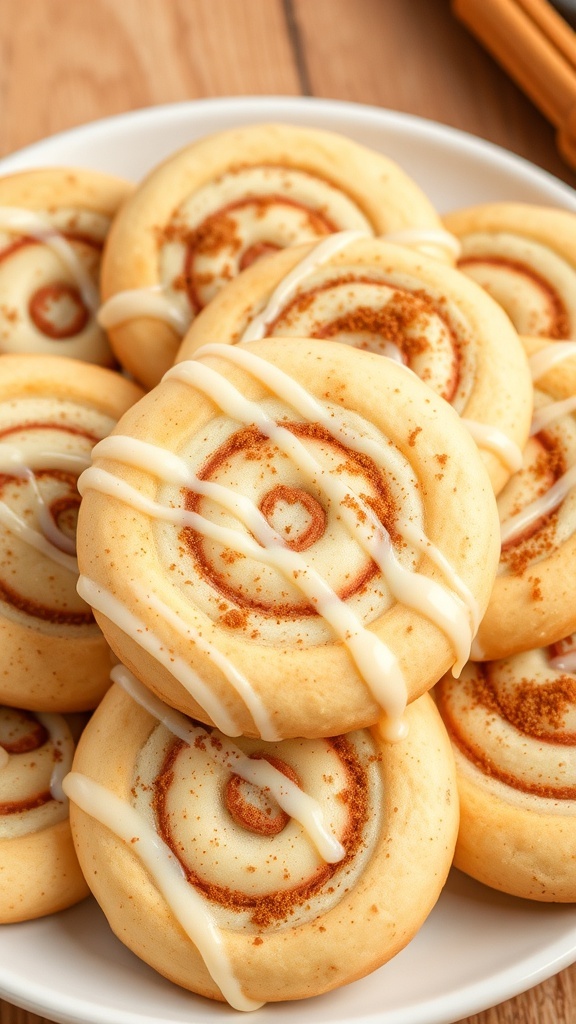 A plate of cinnamon roll snickerdoodle cookies drizzled with icing.