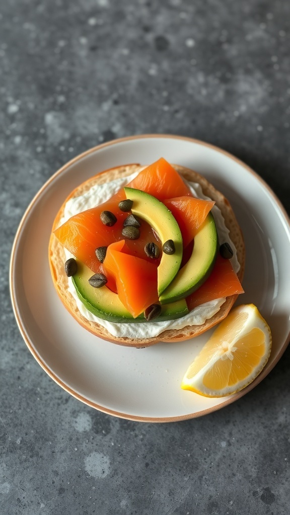 A smoked salmon and avocado bagel topped with cream cheese and capers, served with a lemon wedge.