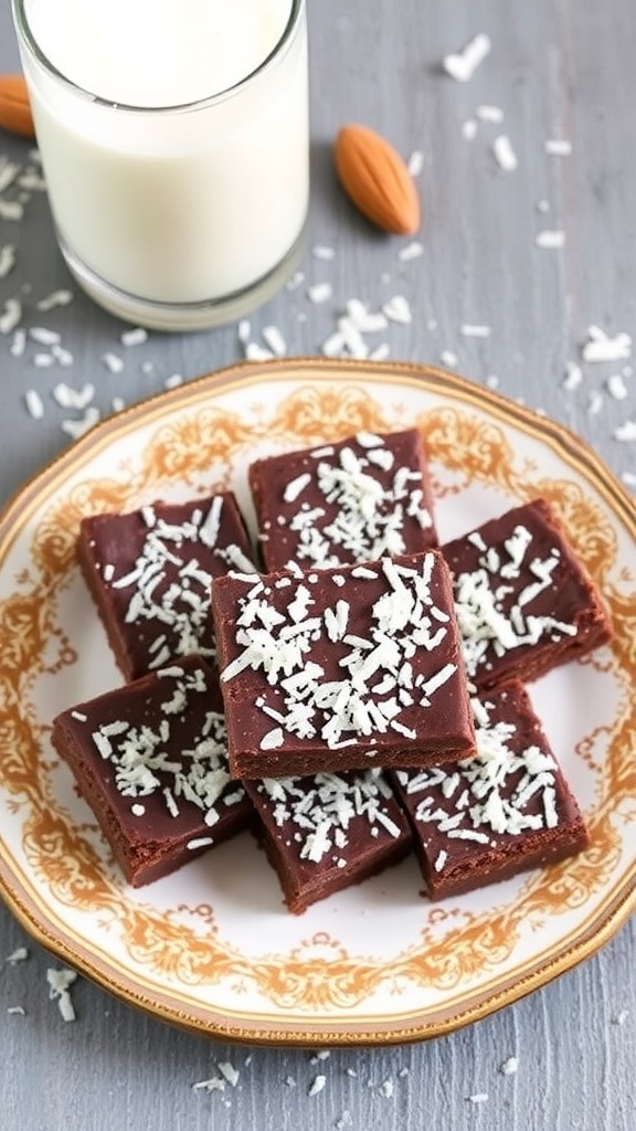 No-bake chocolate coconut bars on a decorative plate with shredded coconut on top, accompanied by a glass of milk.