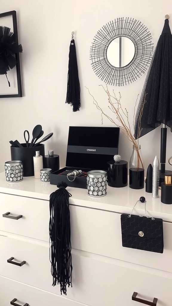 A stylish arrangement of black and silver bedroom accessories on a dresser.
