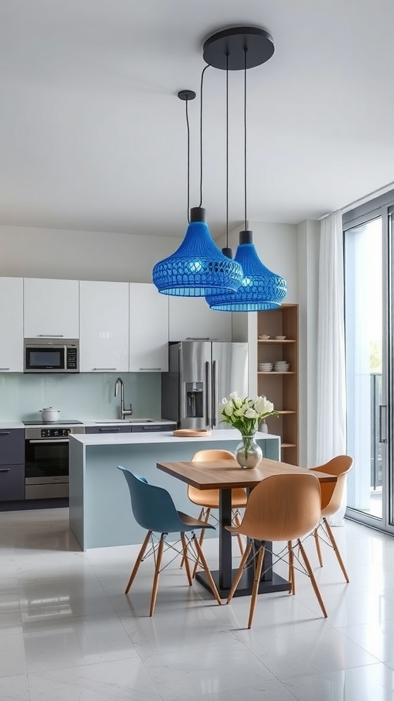 A modern kitchen featuring blue pendant lights above a dining table with wooden chairs.