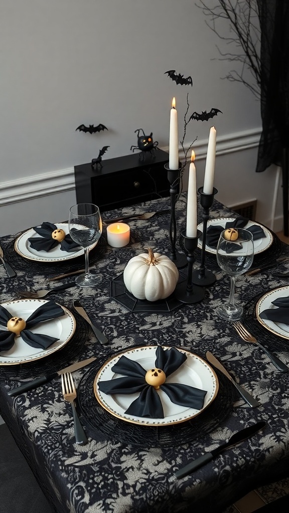 A Halloween-themed table setting with a black lace tablecloth, elegant plates, black napkins, golden pumpkin accents, candles, and bat decorations.