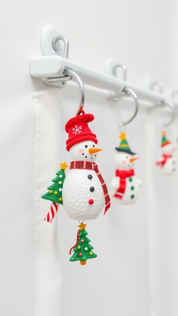 Colorful Christmas-themed shower curtain hooks featuring snowmen and trees.