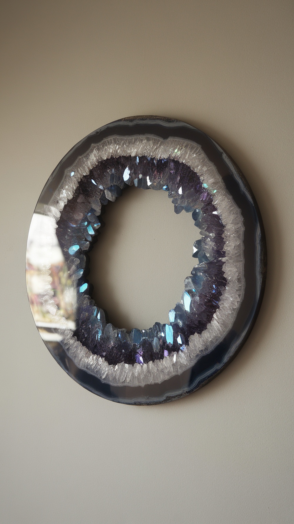 Circular geode-inspired wall art with shimmering crystals in shades of blue and purple.