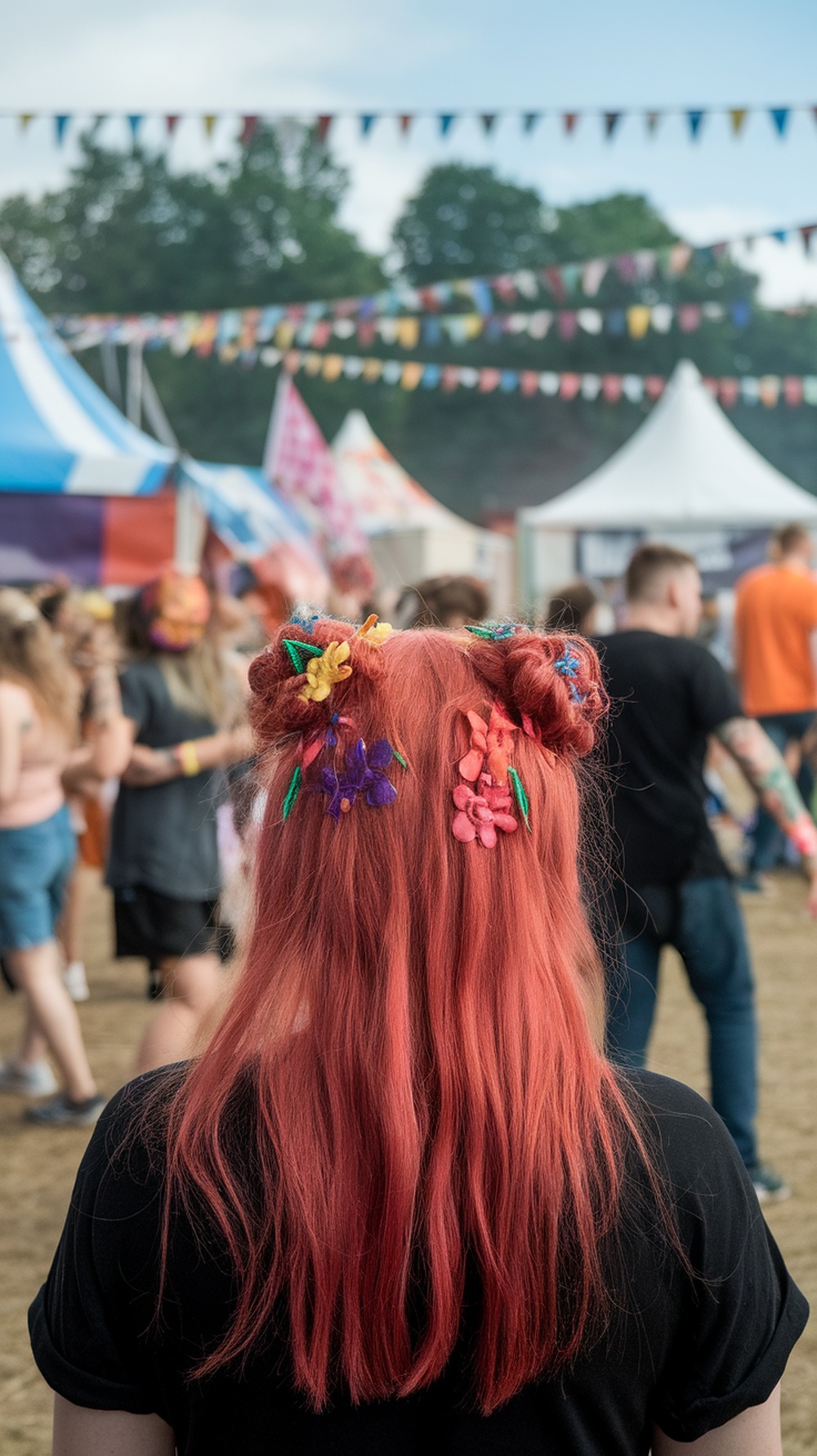 A person with cherry bomb hairstyle adorned with colorful accessories at a festival.