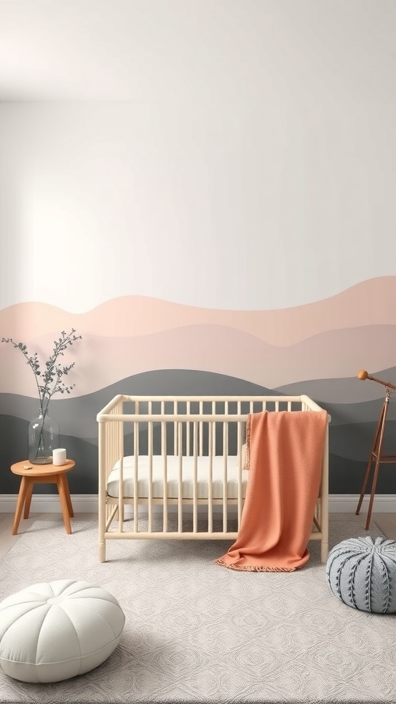 A nursery with an ombre wall design in soft pink and gray colors, featuring a wooden crib and cozy decor.